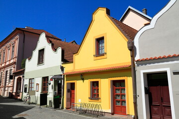 Obraz premium A Vibrant Row of Traditional Central European Buildings, Czech Republic