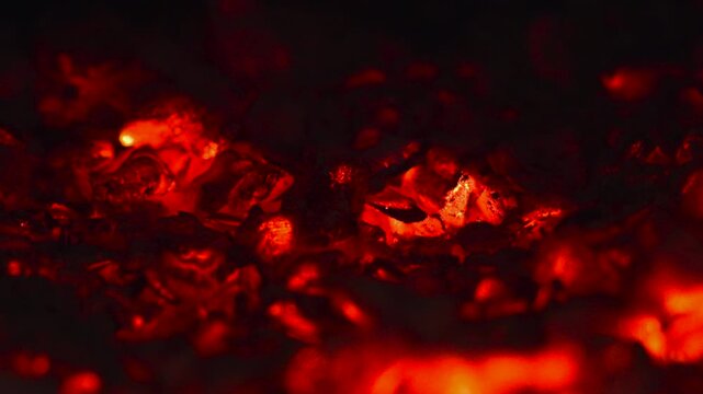 Intense Fiery Forge Scenes. Bright Molten Pockets Illuminating Dark Industrial Environment. Media
