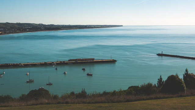 view from above oamaru town harbour sea side ocean calm blue clear scenery landscape beautiful tranquility 