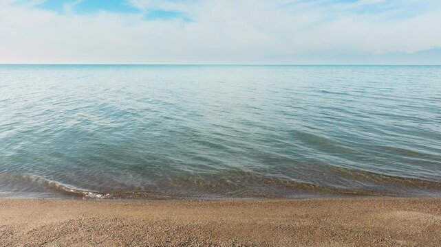Following shoreline of calm Issyk Kul lake in Kyrgyzstan in late autumn. 
