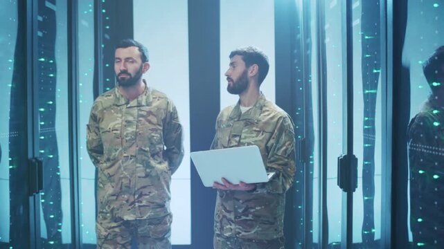 Soldiers work with digital tools, Military personnel troubleshoot technical issues using electronic devices