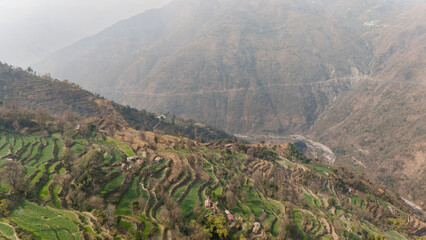 Aerial landscape view of Sainji corn village near Mussoorie, Uttarakhand, with village houses,...