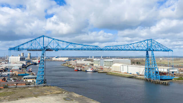 Middlesbrough transport Bridge and river Tees including the port of Tees. Aerial view of the blue landmark bridge in the north east of the United Kingdom