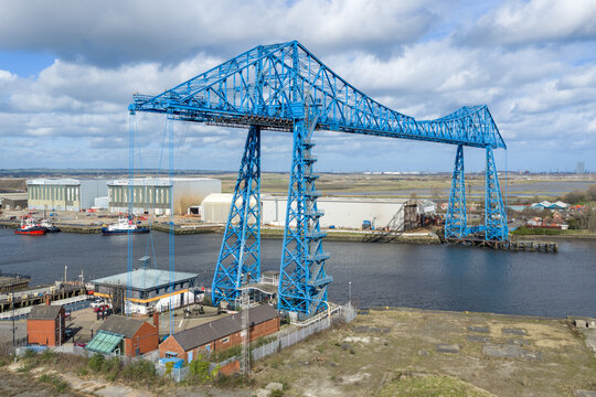 Middlesbrough transport Bridge and river Tees including the port of Tees. Aerial view of the blue landmark bridge in the north east of the United Kingdom