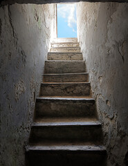 Fototapeta premium Steps from the dark basement to the light