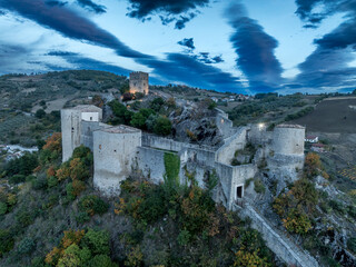 Obraz premium Roccascalegna Castle Lower Walls Towers Courtyard Floodlit Keep Blue Dusk Aerial Abruzzo Italy Medieval
