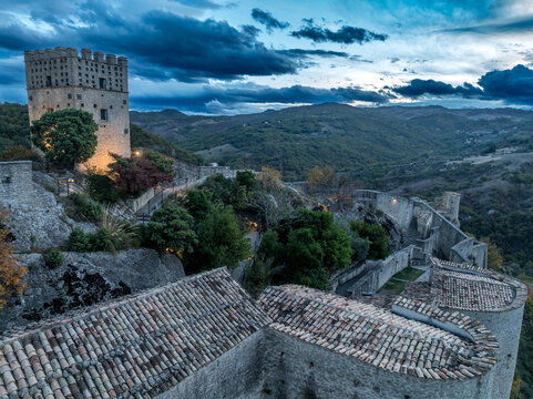 Aerial Views of Roccascalegna: "Sky Castle" on a Sandstone Spur. Square Lombard Keep: The "Torre di Sentinella," the oldest part of the fortress, featuring sharp quadrangular lines typical of early me