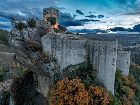 Aerial Views of Roccascalegna: "Sky Castle" on a Sandstone Spur. Square Lombard Keep: The "Torre di Sentinella," the oldest part of the fortress, featuring sharp quadrangular lines typical of early me