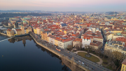 Obraz premium Sunset aerial view of Smetanovo nabrezi riverside in Prague, Cze