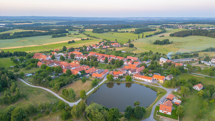 Sunset panorama view of traditional south Bohemian village Holas © dudlajzov
