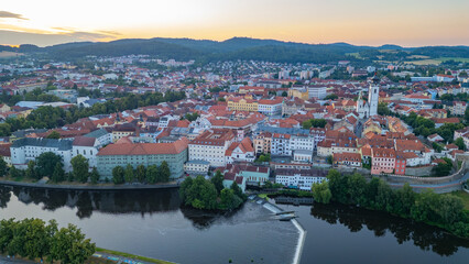 Fototapeta premium sunrise panorama of the old town of Pisek, Czech republic