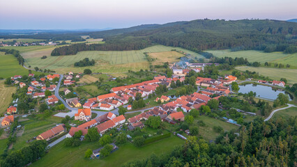 Sunset panorama view of traditional south Bohemian village Holas © dudlajzov