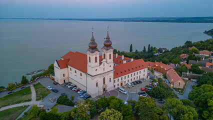 Obraz premium Sunset view of the Tihany Benedictine Abbey beside Balaton lake
