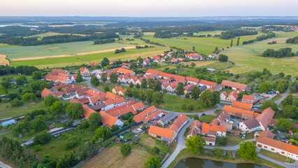 Sunset panorama view of traditional south Bohemian village Holas © dudlajzov