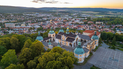 Fototapeta premium Sunset panorama view of Svata Hora pilgrimage site near Pribram,