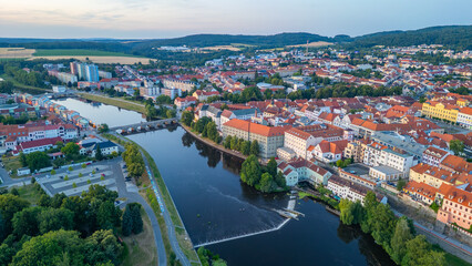Fototapeta premium Sunset panorama of the old town of Pisek, Czech republic