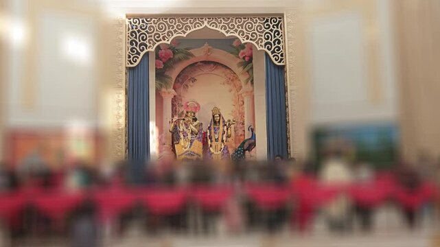 Hindu Deity Idol Decorated in Temple Shrine with Flowers and Ornaments, Devotional Worship Scene, Spiritual India Religious Interior, Sacred Mandir Altar, Faith and Bhakti Concept 4K Footage, India