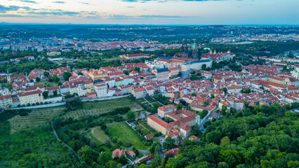 Fototapeta premium Sunset panorama view of Hradcany from Petrin hill in Prague, Cze
