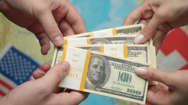 American banker passes stack of dollars to Swiss financier against world map with US and Swiss flags for strengthening banking ties.