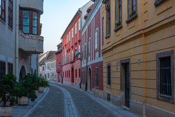 Naklejka premium Sunrise view of a narrow street in Sopron, Hungary