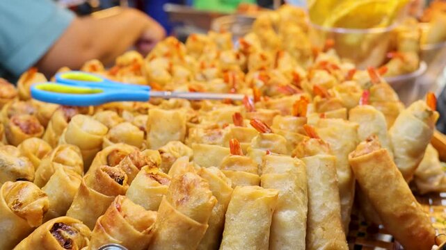 Street Food Fried Spring Rolls Display in Basket at Bangkok Night Market