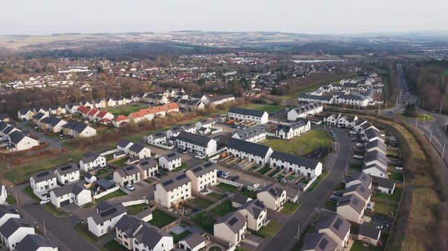 Aerial view of a quiet residential neighborhood and modern housing near Eskbank in Edinburgh, Scotland.