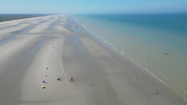 Aerial View of Wide Beach with Water Patterns and Shoreline in Belgium &ndash; Low Tide Coastal Scene