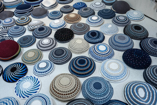 Kipot on a table for sale in Jerusalem.