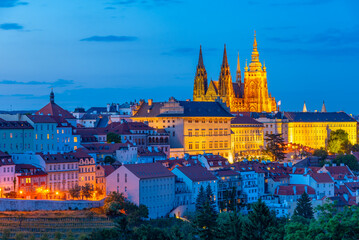 Naklejka premium Sunset view of Prague castle from Petrin hill in Prague, Czech r
