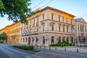 Obraz premium Sunrise view of historical houses in Szeged, Hungary