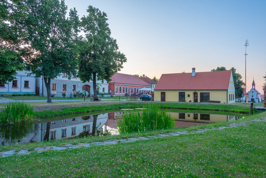 Sunset view of traditional south Bohemian village Holasovice, Cz
