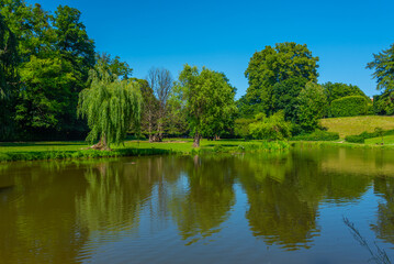 Obraz premium Sunny day at a park at Vizovice palace, Czech republic