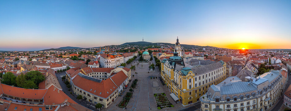 Sunrise at Szechenyi square in the old town of Pecs, Hungary
