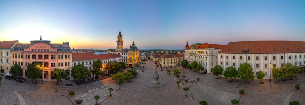Sunrise at Szechenyi square in the old town of Pecs, Hungary