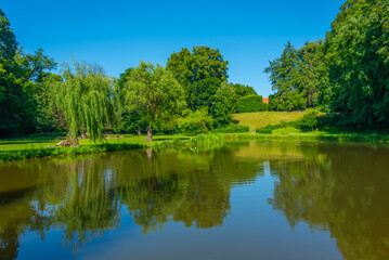 Fototapeta premium Sunny day at a park at Vizovice palace, Czech republic