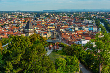 Fototapeta premium Panorama view of Graz in Austria with famous clock tower