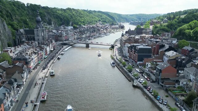 Drone Aerial View of Dinant Bridge over Meuse River with City and Boats in Belgium