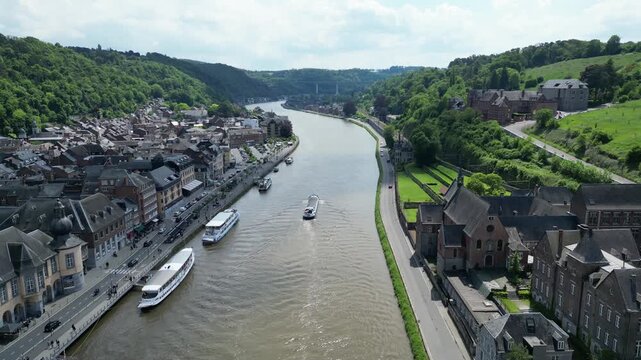 Drone Aerial View of Dinant with Boats on Meuse River &ndash; Scenic Belgian City