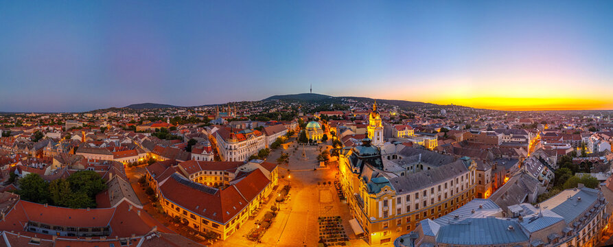 Sunrise at Szechenyi square in the old town of Pecs, Hungary