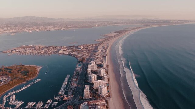 Coronado Silver Strand, ocean view, buildings, island, daylight, waves and sea 
