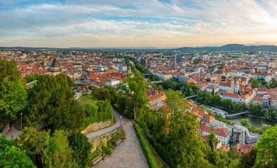 Fototapeta premium Panorama view of Graz in Austria with famous clock tower