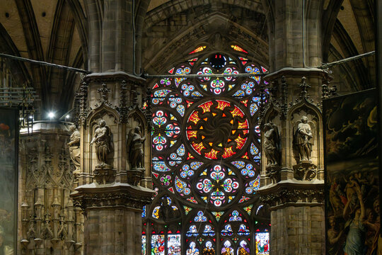 Milan, Italy - 9 Mar 24: Stained glass rose window inside the Duomo di Milano