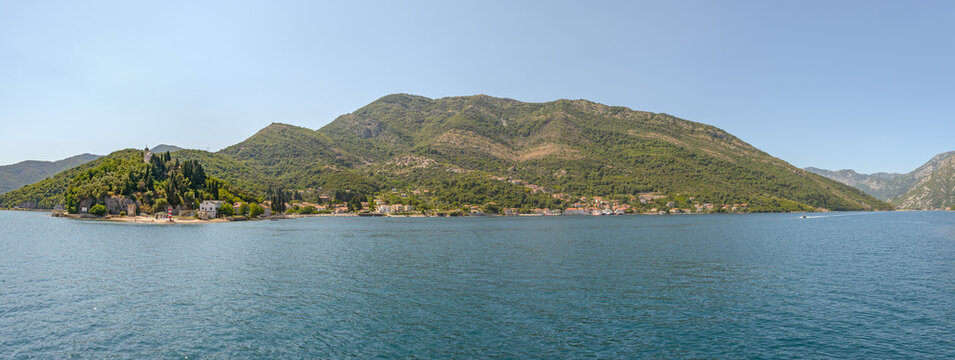 View towards Kamenari location from water of Kotor bay, Montenegro.