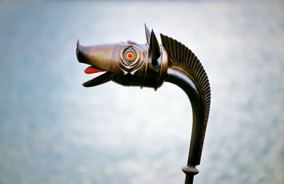 Reconstruction of Celtic Iron Age carnyx found at Deskford, Aberdeenshire, Scotland. Boars head mouth of the bronze war trumpet