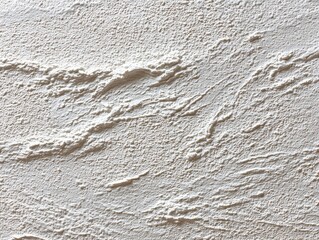 Fototapeta premium Textured surface design and abstract plaster wall background for interior design and decorative finishes A close-up of a white rough wall with a unique pattern modern architecture and creative wall.