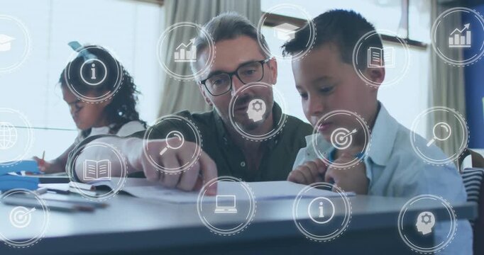Adult tutor pointing at workbook guiding boy learning while education icons fading in over desk
