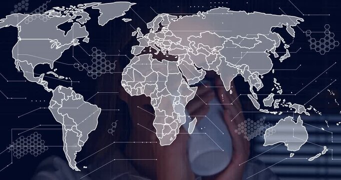 Mid-adult woman lifting mug, starting tech map layer forming over face into hex grid, showing data
