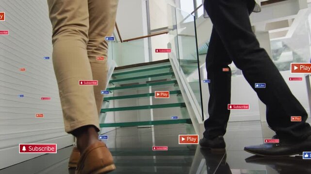 Two execs walking glass stairs, stepping onto treads and causing floating icons en route to meeting