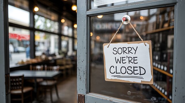 Sorry we are closed sign hanging on door representing business closure and service unavailable concept
