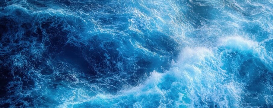 Vast blue ocean with dynamic white foamy waves and churning water, a powerful seascape that evokes motion, depth, and awe